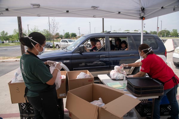 Volunteers distributing food