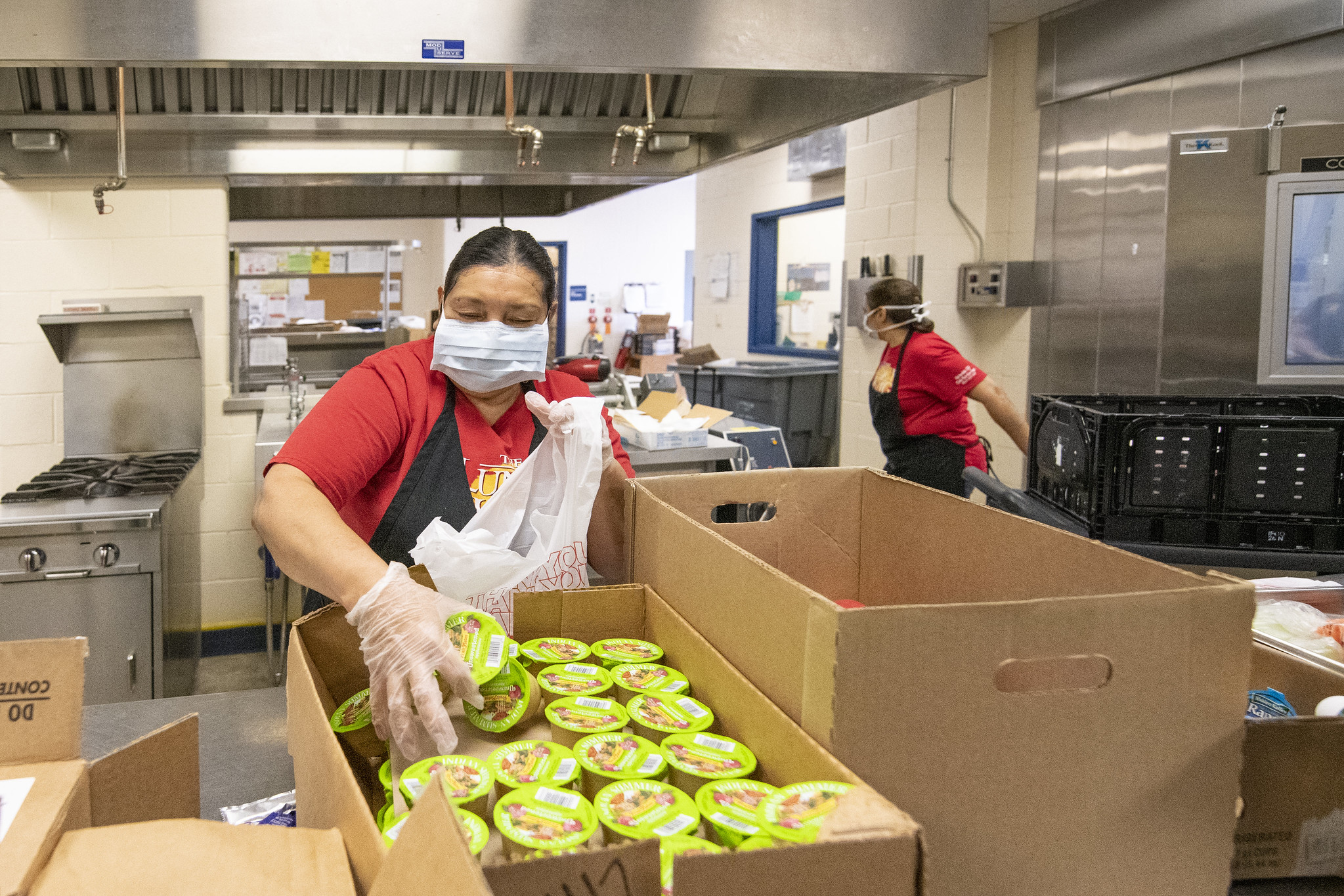 Women sorting food at food pantry